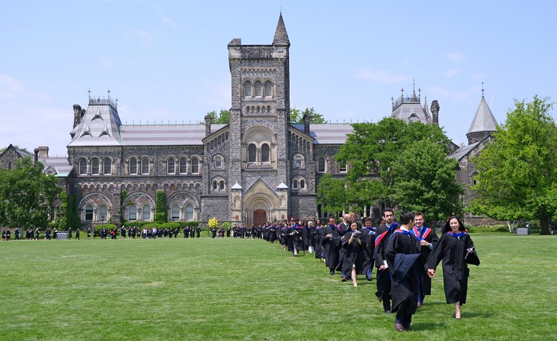 Toronto, Canada - June 7, 2018:  Graduates of the Faculty of Medicine at the University of Toronto march in a procession across campus to receive their diplomas.